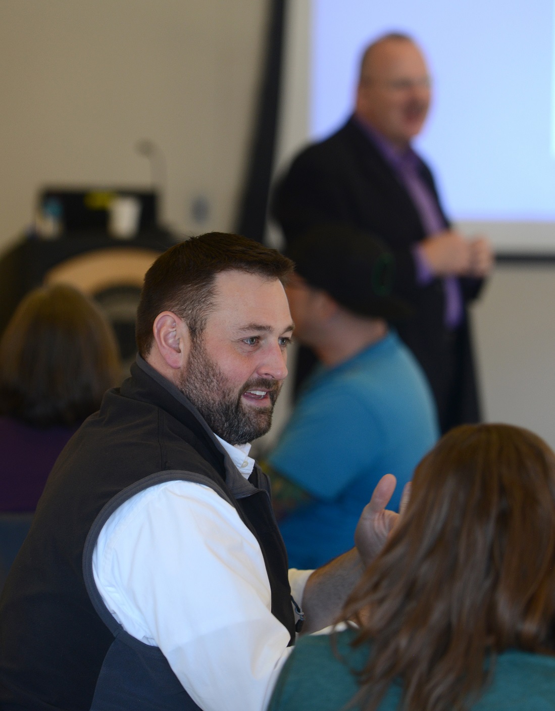 Staff members participating in an Excel at CC session.